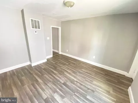 Living - 107 S Dean St, Baltimore, MD 21224 photo 4 of 5