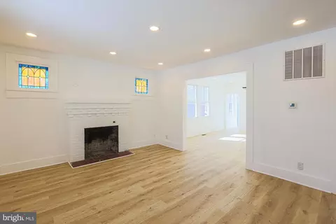 Living - 3916 W Strathmore Ave, Baltimore, MD 21215 photo 1 of 7