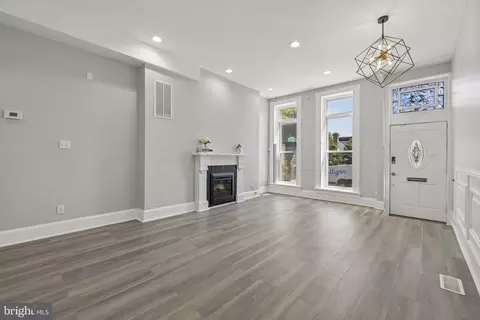 Living - 1628 E Biddle St, Baltimore, MD 21213 photo 1 of 5