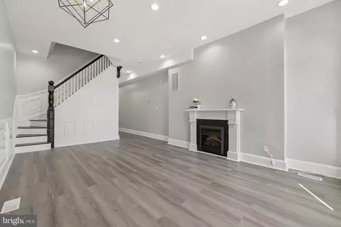 Living - 1628 E Biddle St, Baltimore, MD 21213 photo 4 of 5