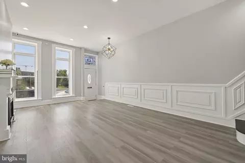 Living - 1628 E Biddle St, Baltimore, MD 21213 photo 2 of 5