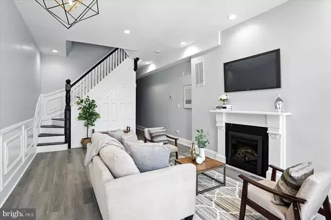 Living - 1628 E Biddle St, Baltimore, MD 21213 photo 3 of 5