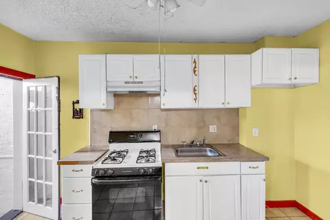 Kitchen - 1632 E 31st St, Baltimore, MD 21218 photo 1 of 2