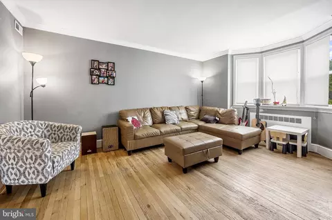 Living - 920 E Lake Ave, Baltimore, MD 21212 photo 1 of 2