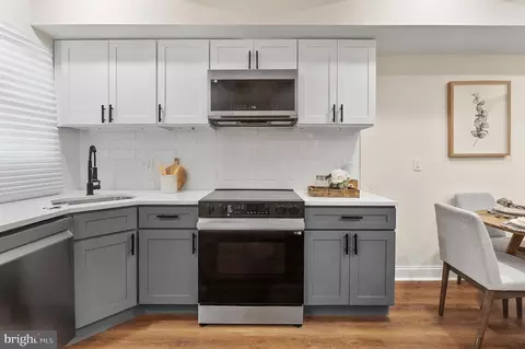 Kitchen - 323 S Stricker St, Baltimore, MD 21223 photo 2 of 2