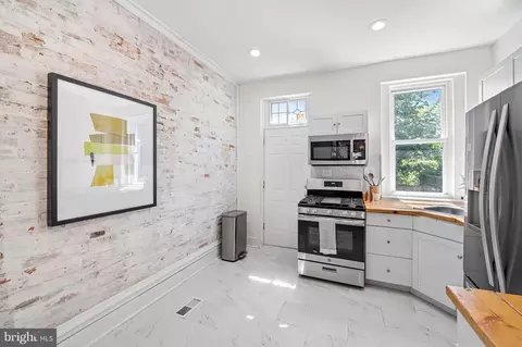 Kitchen - 517 E 35th St, Baltimore, MD 21218 photo 5 of 5