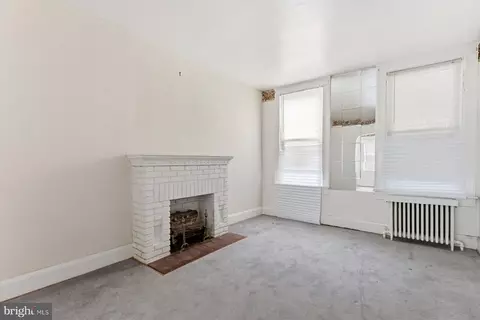 Living - 1615 E 31st St, Baltimore, MD 21218 photo 3 of 5