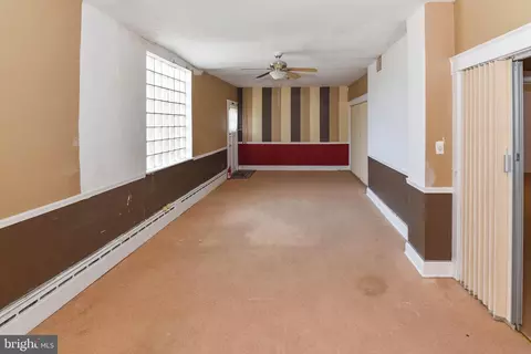 Living - 2431 E Oliver St, Baltimore, MD 21213 photo 4 of 11