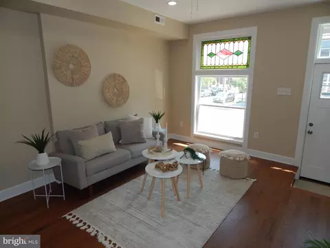 Living - 3042 E Monument St, Baltimore, MD 21205 photo 2 of 8