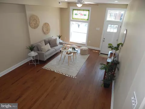Living - 3042 E Monument St, Baltimore, MD 21205 photo 1 of 8