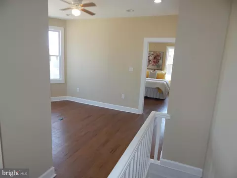 Living - 3042 E Monument St, Baltimore, MD 21205 photo 7 of 8