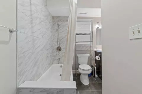 Bath - 618 Wicklow Rd, Baltimore, MD 21229 photo 1 of 4