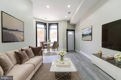 Living - 1306 E Lafayette Ave, Baltimore, MD 21213 photo 2 of 4