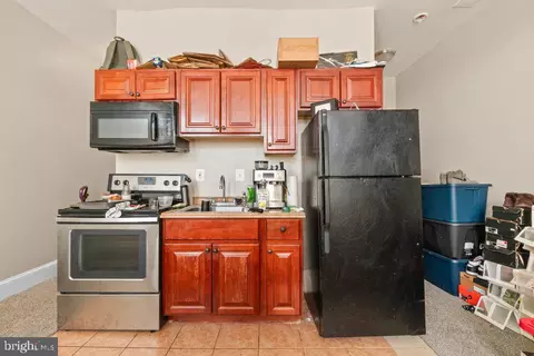 Kitchen - 30 E 25th St, Baltimore, MD 21218 photo 3 of 3