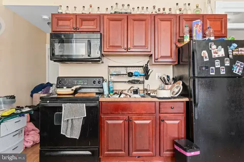 Kitchen - 30 E 25th St, Baltimore, MD 21218 photo 2 of 3