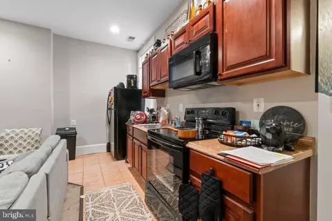 Kitchen - 30 E 25th St, Baltimore, MD 21218 photo 1 of 3