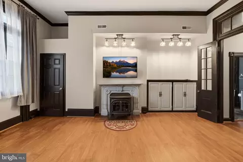 Living - 17 W Chase St, Baltimore, MD 21201 photo 1 of 2