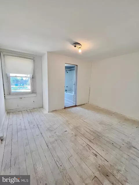 Bedroom - 941 E Chase St, Baltimore, MD 21202 photo 2 of 3