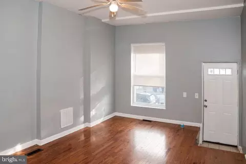 Living - 2630 E Monument St, Baltimore, MD 21205 photo 1 of 2
