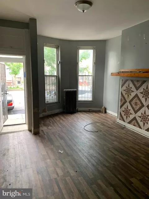 Living - 2432 E Lafayette Ave, Baltimore, MD 21213 photo 1 of 2