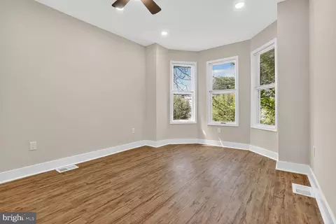 Living - 1701 N Monroe St, Baltimore, MD 21217 photo 1 of 2