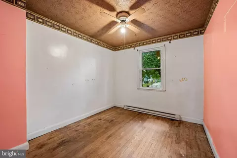 Bedroom - 4140 6th St, Baltimore, MD 21225 photo 5 of 11