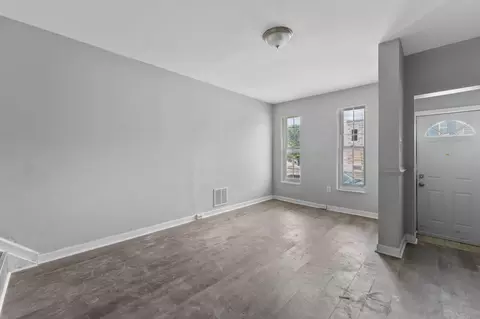 Living - 1706 N Milton Ave, Baltimore, MD 21213 photo 4 of 5