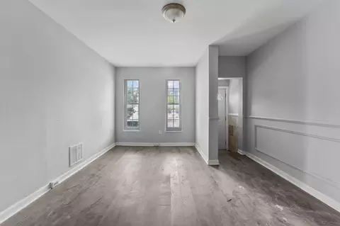 Living - 1706 N Milton Ave, Baltimore, MD 21213 photo 3 of 5