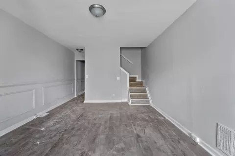 Living - 1706 N Milton Ave, Baltimore, MD 21213 photo 2 of 5