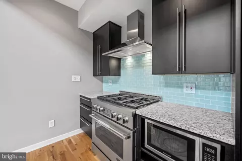 Kitchen - 705 S Durham St, Baltimore, MD 21231 photo 1 of 2