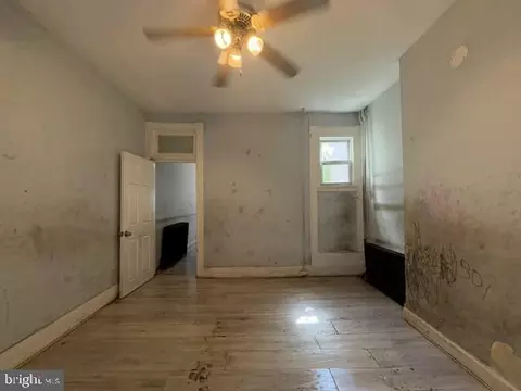 Living - 1114 Myrtle Ave, Baltimore, MD 21201 photo 1 of 4
