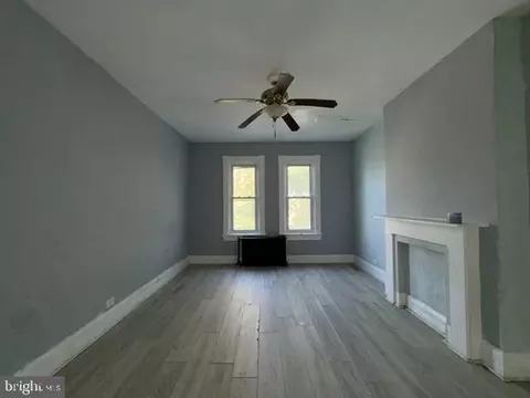 Living - 1114 Myrtle Ave, Baltimore, MD 21201 photo 2 of 4