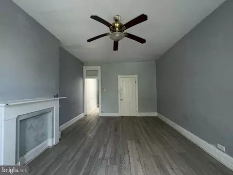 Living - 1114 Myrtle Ave, Baltimore, MD 21201 photo 3 of 4