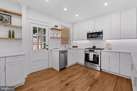 Kitchen - 516 E 39th St, Baltimore, MD 21218 photo 3 of 7