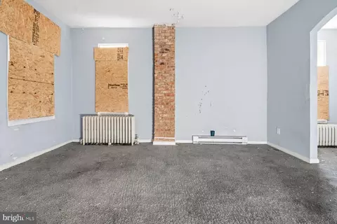 Living - 2420 Greenmount Ave, Baltimore, MD 21218 photo 5 of 9