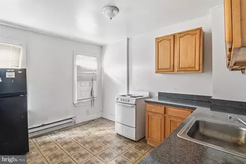 Kitchen - 2420 Greenmount Ave, Baltimore, MD 21218 photo 2 of 4