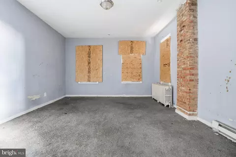 Living - 2420 Greenmount Ave, Baltimore, MD 21218 photo 2 of 9