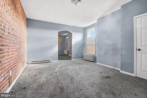 Living - 2420 Greenmount Ave, Baltimore, MD 21218 photo 1 of 9