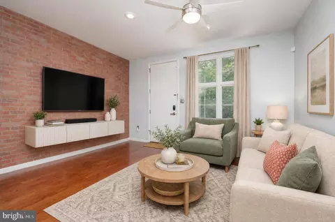 Living - 428 E Oliver St, Baltimore, MD 21202 photo 1 of 2