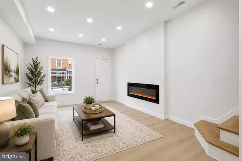 Living - 744 Bartlett Ave, Baltimore, MD 21218 photo 2 of 3