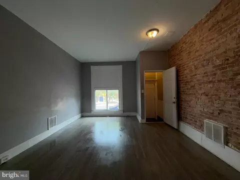 Living - 3227 E Baltimore St, Baltimore, MD 21224 photo 2 of 3