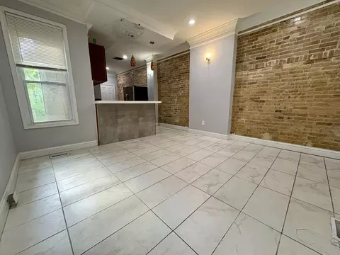 Living - 8 S Payson St, Baltimore, MD 21223 photo 4 of 5