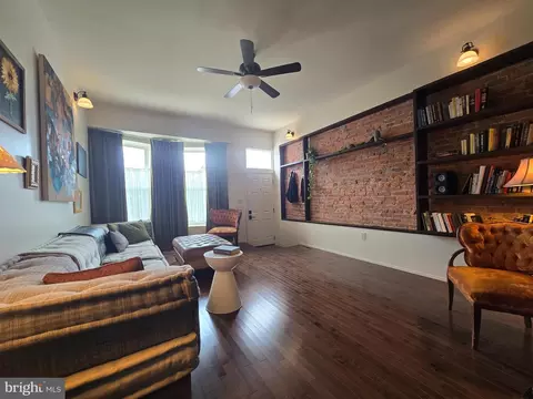 Living - 804 E North Ave, Baltimore, MD 21202 photo 1 of 2