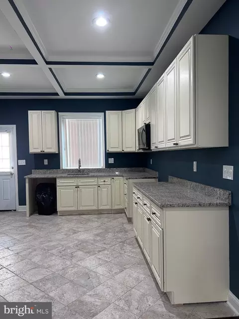 Kitchen - 3124 E Baltimore St, Baltimore, MD 21224 photo 1 of 2