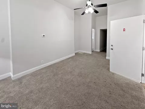 Living - 910 N Arlington Ave, Baltimore, MD 21217 photo 1 of 1
