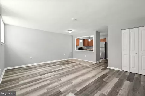 Living - 906 N Fulton Ave, Baltimore, MD 21217 photo 2 of 3