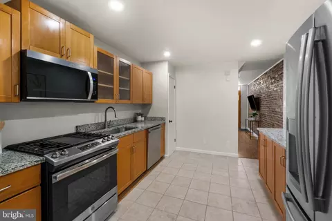 Kitchen - 909 S Streeper St, Baltimore, MD 21224 photo 3 of 5