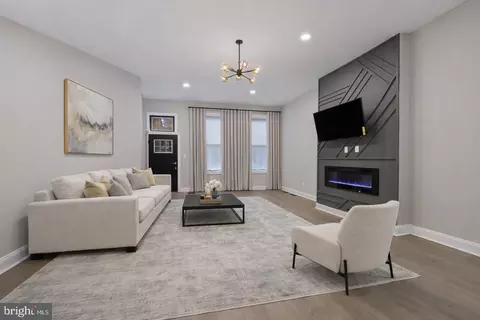 Living - 318 N Stricker St, Baltimore, MD 21223 photo 2 of 3