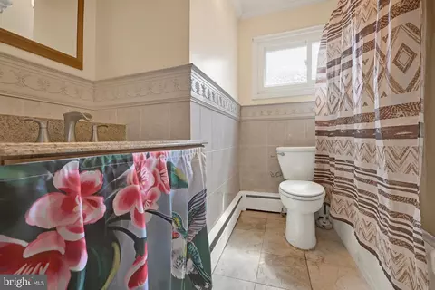Bath - 5713 Anthony Ave, Baltimore, MD 21206 photo 1 of 2