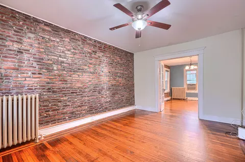 Living - 205 E 32nd, Baltimore, MD 21218 photo 2 of 4